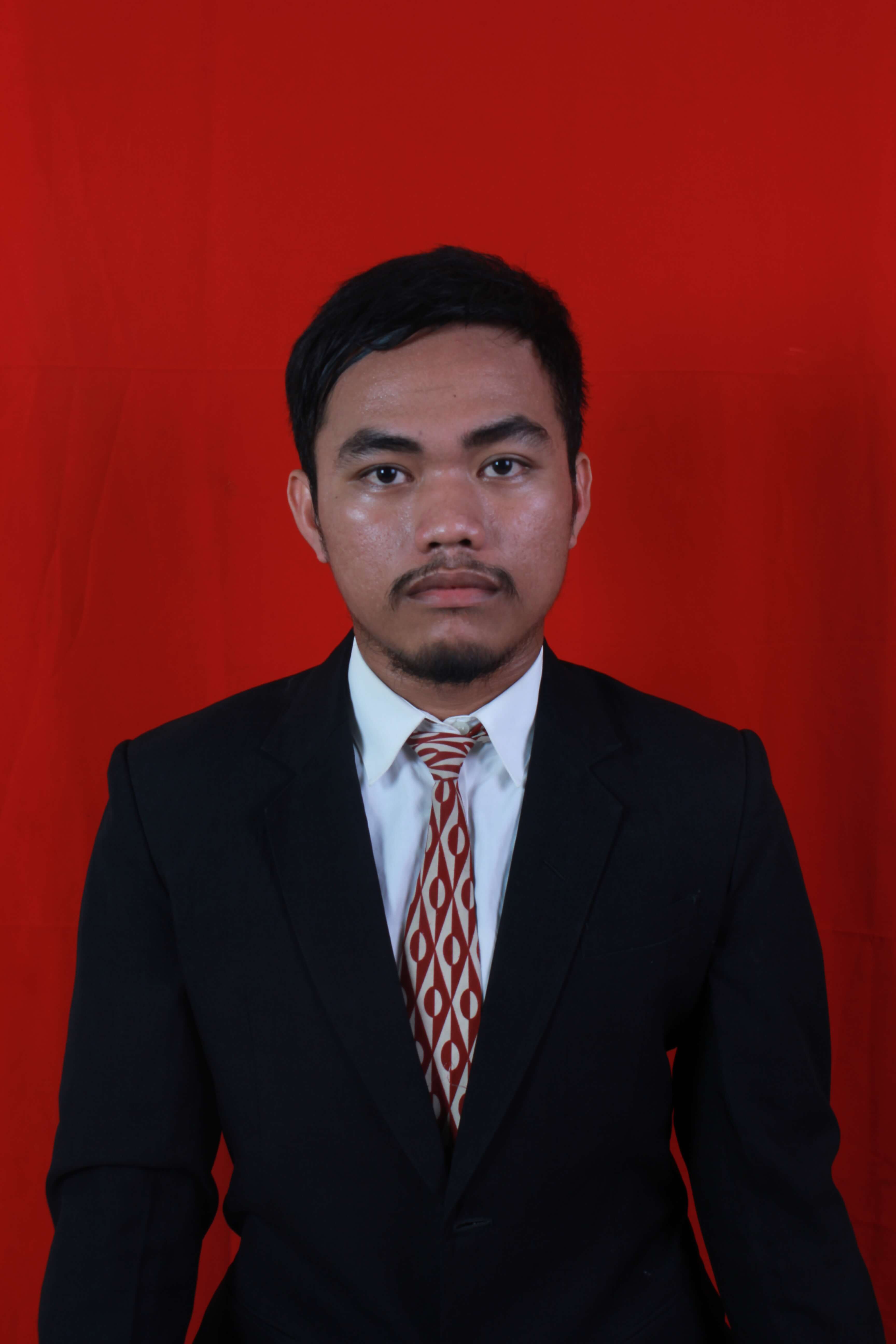 Ahmad Faizal, S.Sos